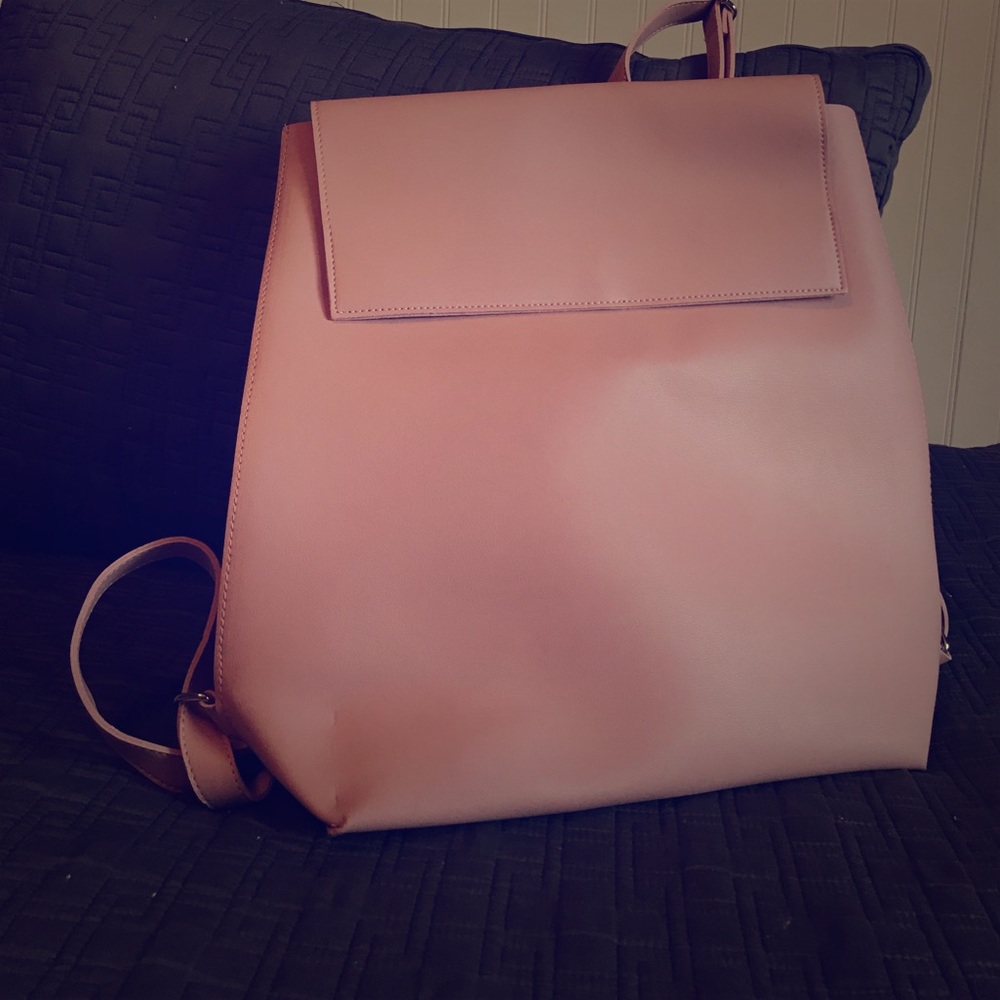 Super cute pink vegan leather backpack